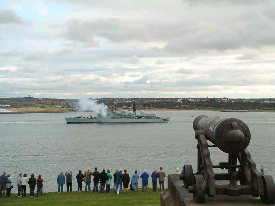 HMS Newcastle passing the Collingwood Monument with 11 gun salute